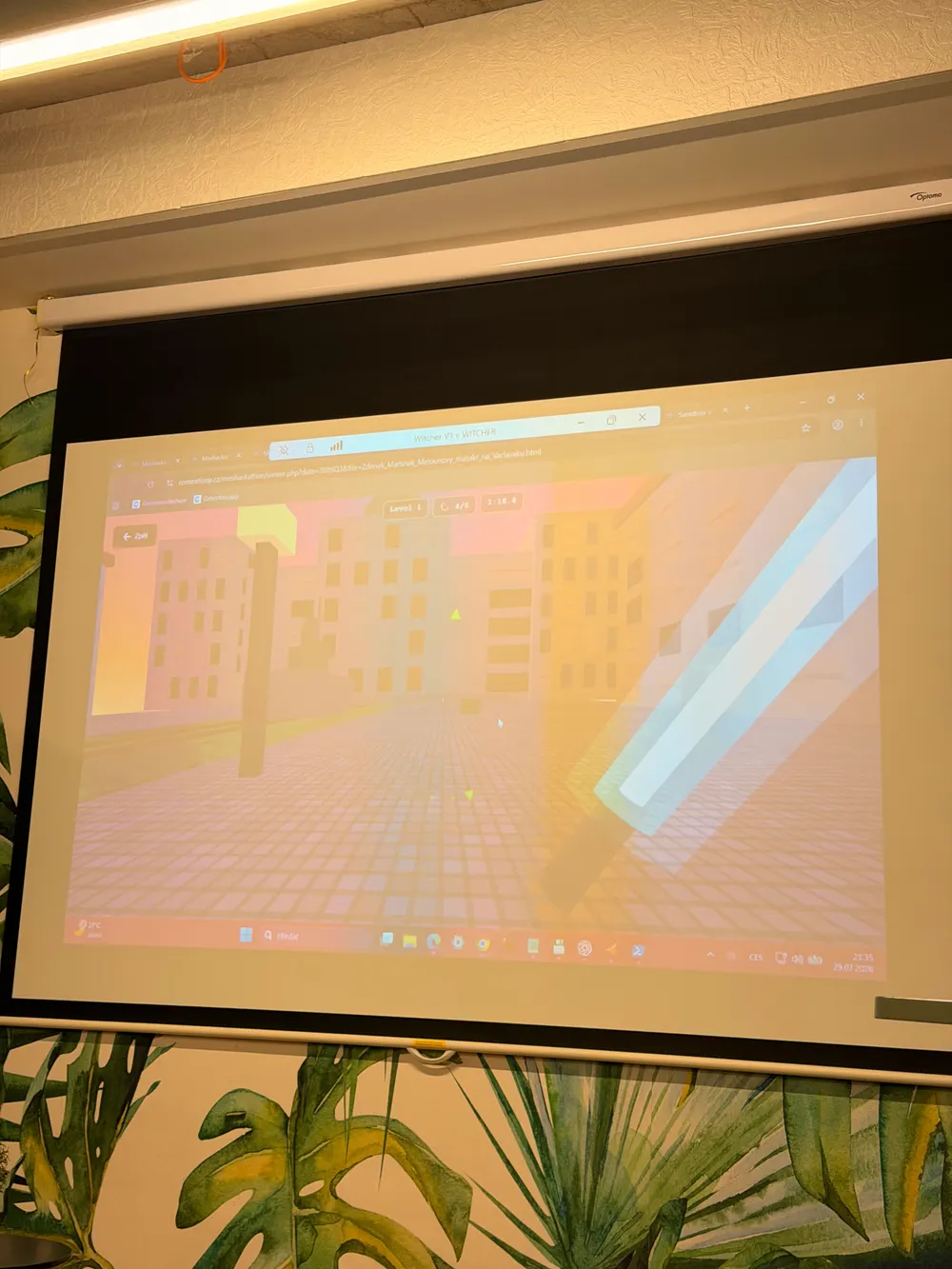 Světelný meč ve vítězné hře na projekci